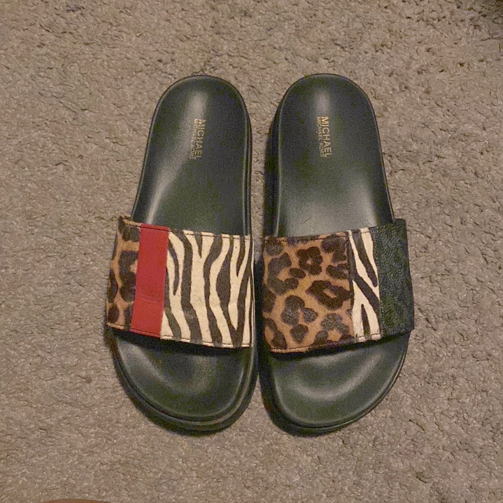 Michael Kors Slides. Size 8. $65 is the price